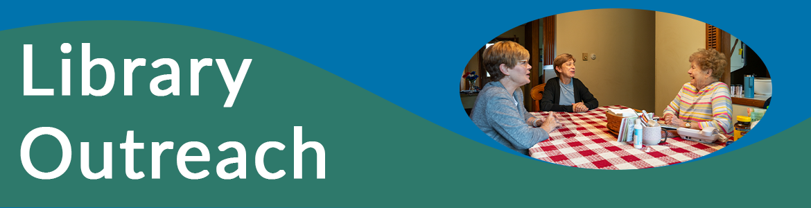 Outreach banner showing three women sitting around what looks to be a dining table mid-discussion