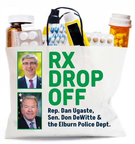 A white paper grocery bag filled with prescription drugs. On front of the bag are pictures of Representative Dan Ugaste and Senator Don DeWitte and the words Rx Drop Off, Rep. Dan Ugaste, Sen. Don DeWitte & the Elburn Police Dept.