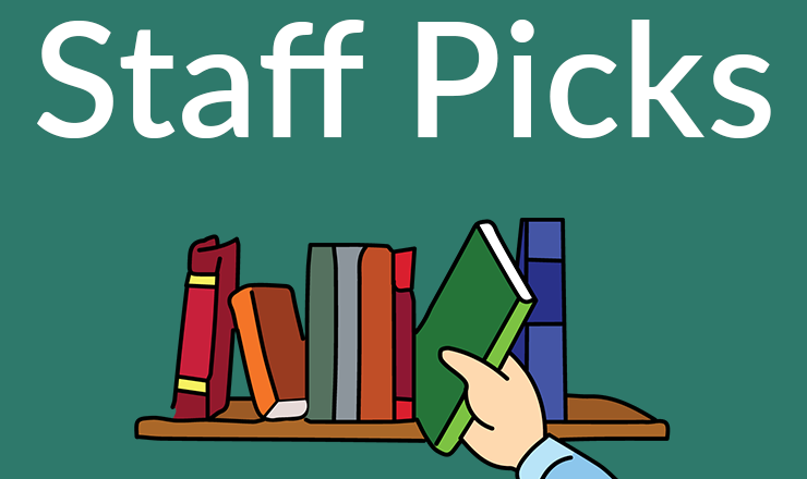 A hand pulls a book off of a shelf